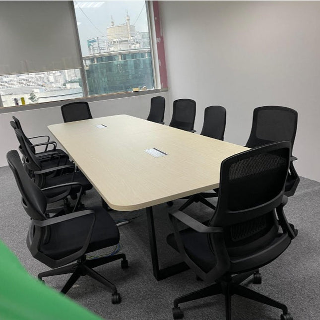 Long conference table with chairs