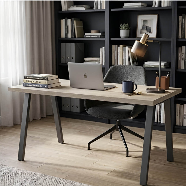 Modern home office with a desk, chair, laptop, and books.