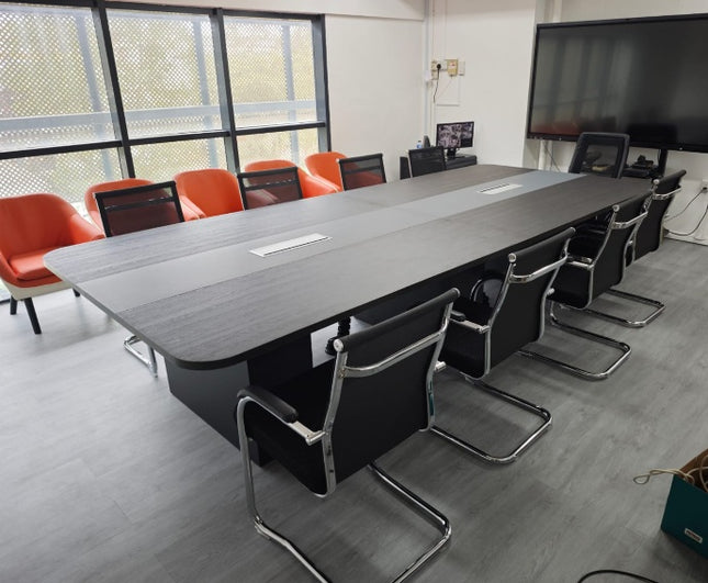 Dual-Tone Modern Conference Table with integrated cable management.