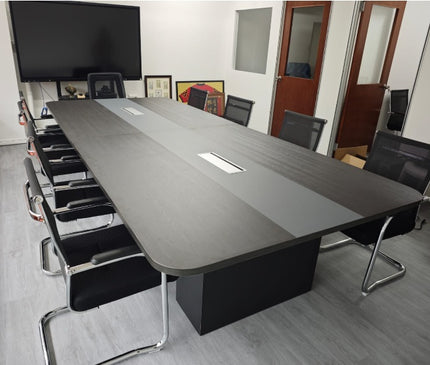 Dual-Tone Modern Conference Table with integrated cable management.