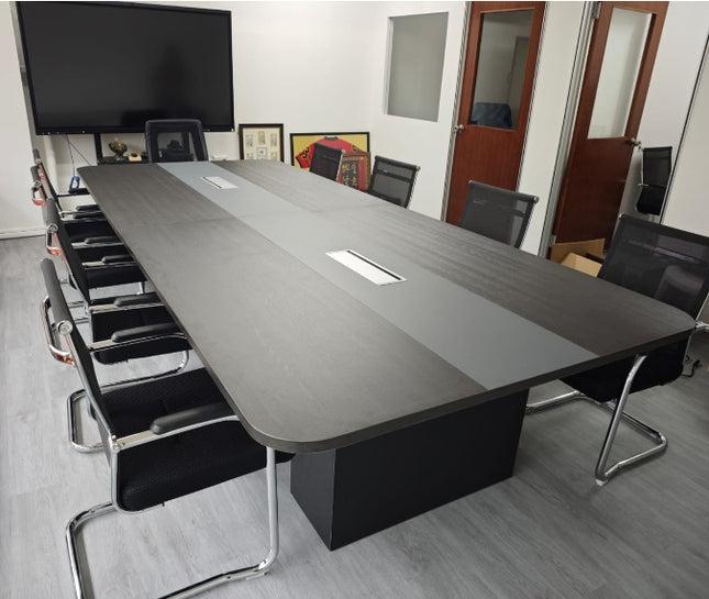 Dual-Tone Modern Conference Table with integrated cable management.